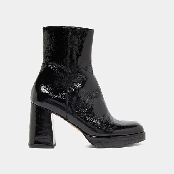 Platform boots with square toes in black shiny leather